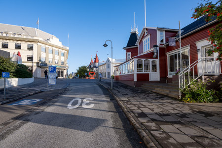 Akureyri, Iceland - September 9, 2023 - Colorful, picturesque street scene in Akureyri city center on clear sunny autumn morning.のeditorial素材