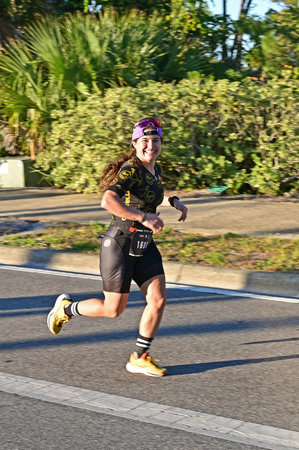 Panama City Beach, Florida - November 4, 2023 - Young woman runs marathon portion of 2023 Ironman competition.のeditorial素材