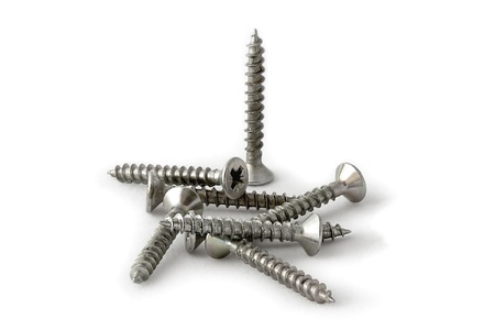 Group of screws isolated on a white background, photograph taken with a Macro Lens (100mm+3Dpt)の写真素材