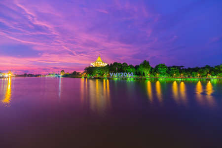 Colorful sky at dusk on the Sarawak River from the Waterfront Promenade in Kuching, Borneo, Malaysia.の写真素材