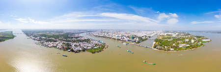 Aerial view Can Tho city skyline from above, Mekong river delta, South Vietnam. Famous tourism destination floating markets. Clear blue sky.の写真素材