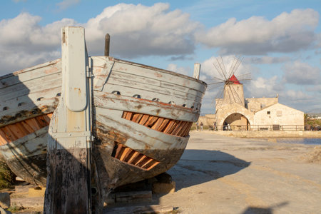 Ancient fisher boat in the salt winning area of Trapaniの写真素材