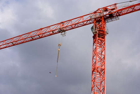 Cranes at work in a construction siteの写真素材