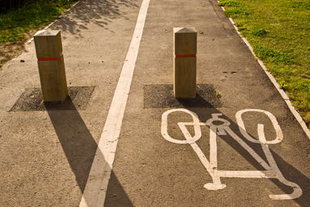 Sign of cycling path. The way is blocked for cars.の写真素材