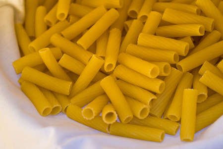 Italian dried pasta on white background.の写真素材