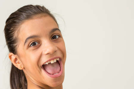 Smiling girl, side faceの写真素材