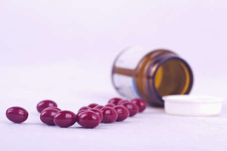 Drugs spreading on the table with medicine bottle の写真素材