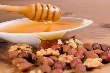 Close up honey and oil seeds