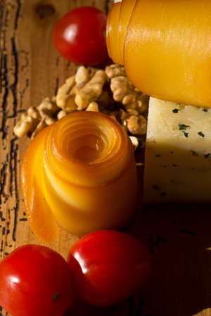 Cheese, tomatos and walnutsの写真素材