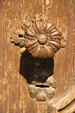 Old decorative wooden door knobの写真素材