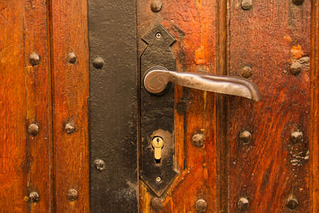 Detail of an old wooden doorの写真素材