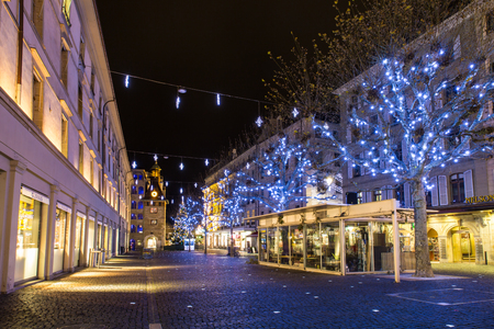 Geneva, Switzerland - December 13, 2014: The Molard square at night illuminated by Christmas decorations, in downtown Geneva.のeditorial素材