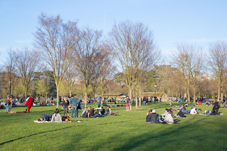 Lyon, France - March 26, 2016: The crowded Parc de la Tete d'Or, a public park located in  the French city of Lyon, on the Easter weekend.のeditorial素材