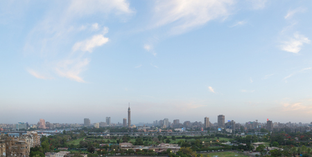 Cairo, Egypt - May 22, 2016: Central Cairo skyline at dusk, the Nile river, the Island of Zamalek and the 6th October Bridge and the Cairo Tower.のeditorial素材