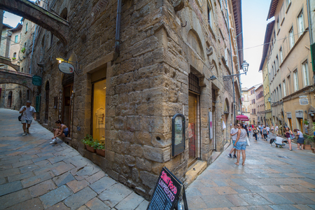 Volterra, Italy - August 3, 2016: Wide angle view of the streets of the medieval city of Volterra, Tuscany, Italy.のeditorial素材