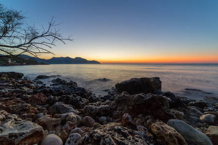 The mediterranean sea on the Spanish island of Mallorca at dawn.の写真素材