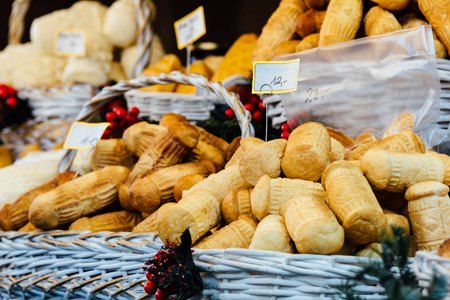 Traditional Polish smoked cheese on a Christmas market stand in Krakow, Poland.の写真素材