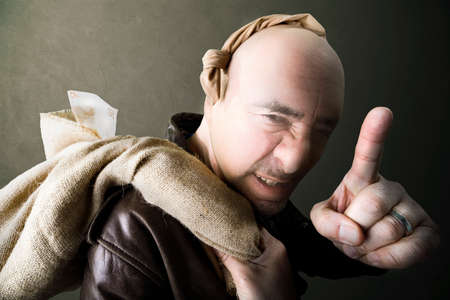 Gangster threating for silence after robbery fifty eurosの写真素材