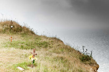 Life and death  Christian crosses to remember suicides at Beachy Head, a famous suicide location on the South Downs Way, near Eastbourne, East Sussex, England, UKの写真素材