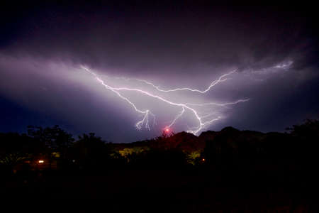 Lightning strike at nightの写真素材
