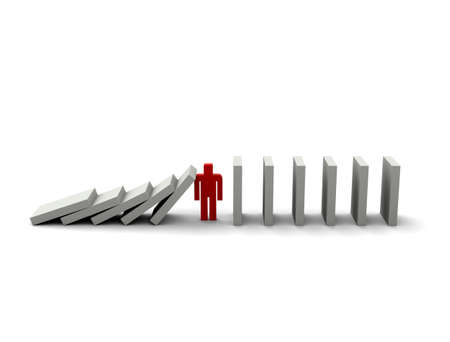 Dominoes causing chain reactionの写真素材