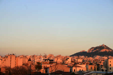 A general view of a neighborhood in Athens at sunsetの写真素材