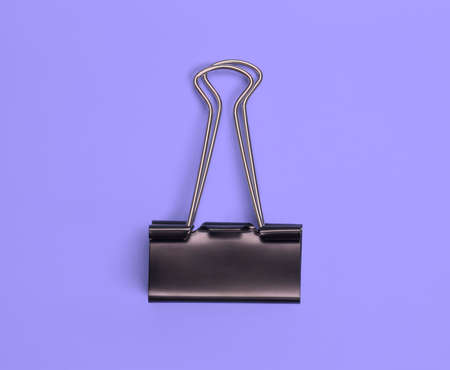 Black paper clip view from above on colored backgroundの写真素材