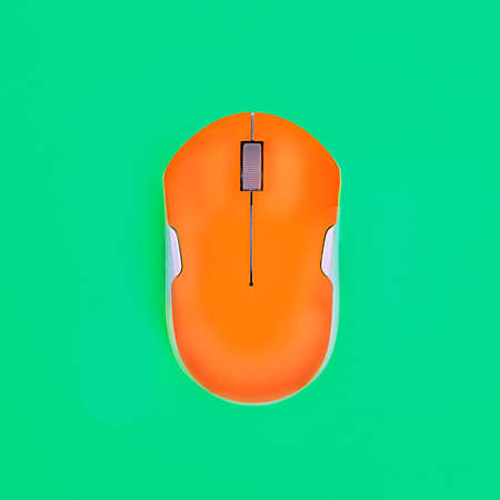 Colorful computer mouse on colored backgroundの写真素材