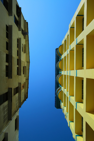 Skyscrapers from below.Office buildings stretch up to the blue sky in the financial district in downtownの写真素材