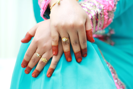 Gold ring on bride's fingerの写真素材