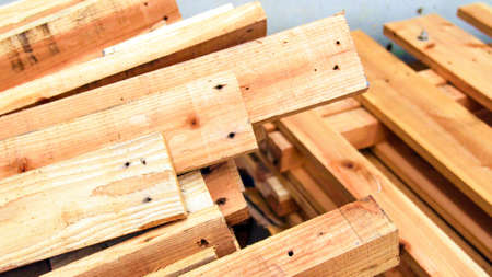 Sawn timber to be cut is placed pile の写真素材
