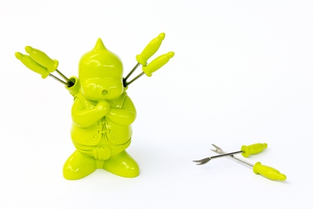 Carving forks on a white background made of ceramic and silver.の写真素材