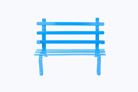 Small blue chair on white background made of ductile iron with the blue coating.の写真素材