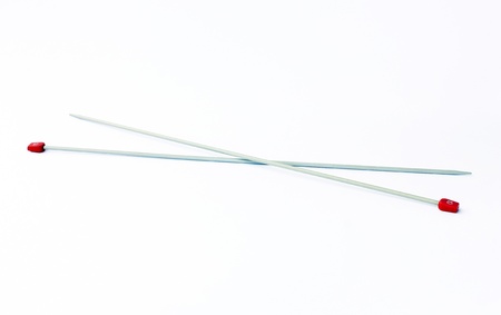 Knitting needles number 10 on a white backgroundの写真素材