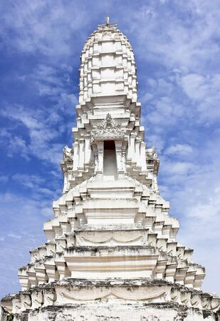 A graceful majestic white prang. Generality in Thailand, for Buddhist buildings created with money donated by people to hire artist. They are public domain or treasure of Buddhism, no restrict in copy or use. This photo is taken under these conditions.の写真素材