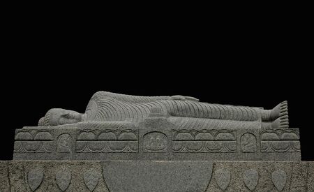 The reclining Buddha statue carved of stone place on the podium.の写真素材