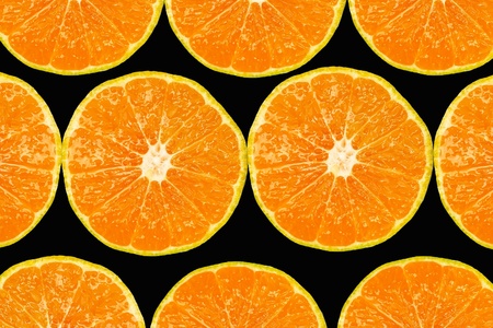 Pattern of fresh slices orange on black background.の写真素材