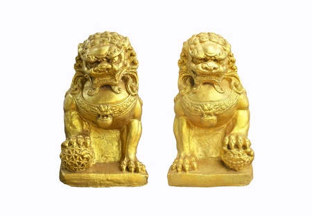 Pairs of guardian lions, common decorative and symbolic elements at the entrances to restaurants, hotels, supermarkets and other structures, with one sitting on each side of the entrance.の写真素材