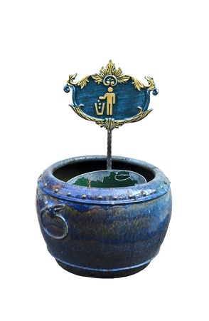 Antique green trash jar isolated on white background の写真素材