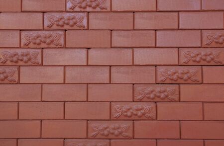 Brick wall with flower pattern, can be used as backgroundの写真素材