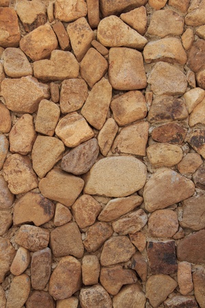 Orange vintage style stone wall, can be used as background の写真素材