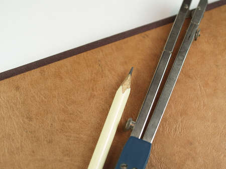 vintage notebook texture pencil and compassesの写真素材