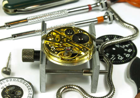 open clock machine and several horology toolsの写真素材