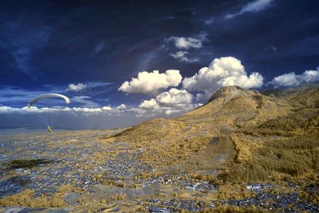 paragliding on landscapeの写真素材