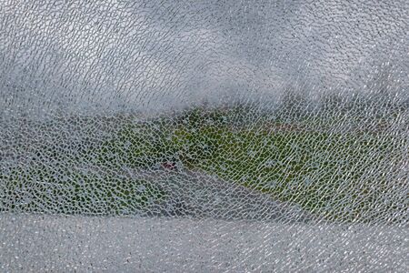 Abstract background of cracked and broken glass