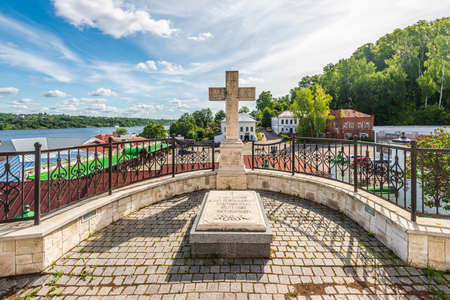 Plyos, Ivanovo region, Russia - August 1, 2021: Stone cross near the church. Inscription: worship crossのeditorial素材