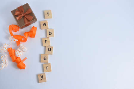 The month of February is written in wooden letters on a white background. The calendar. Winter.の写真素材