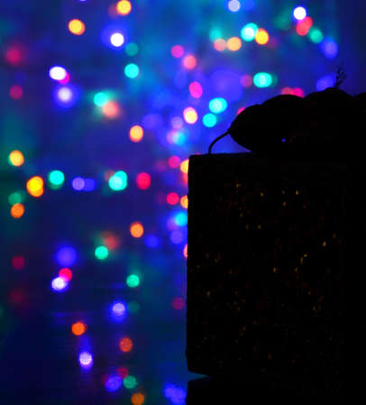 New Year gift on a Christmas background