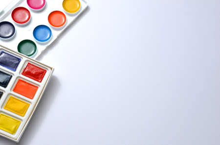 Watercolor paints on a white background.の写真素材