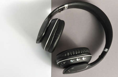 Large black wireless headphones on a white background.
